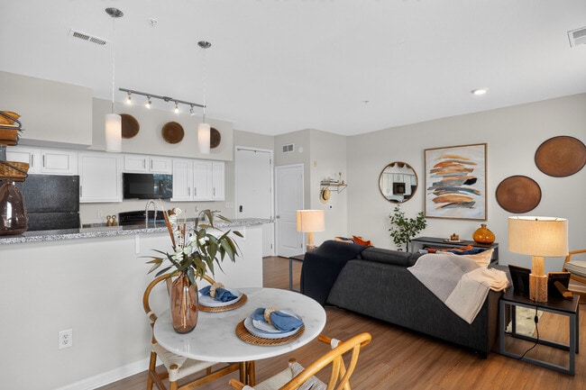 Open-Concept Living Room and Cozy Bedroom at Ralston Apartments in Downtown Indianapolis - Ralston Apartments