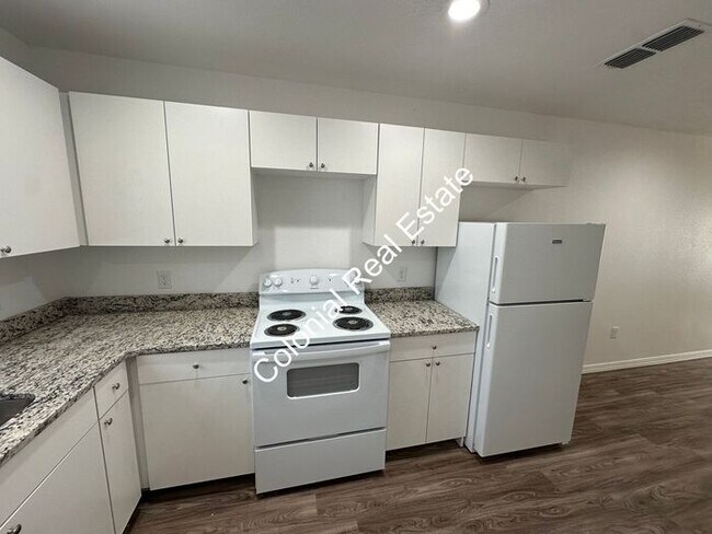 Photo - Spacious and updated 2 bedroom 2 bathroom apartment for rent. Central heat and air, granite count... Unit a