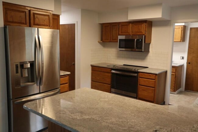 Photo - Spacious 4 Bed / 3 Bath Near Downtown with Two Master Bedrooms!