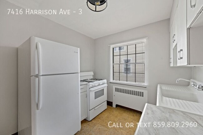 Building Photo - 7416 Harrison Ave Unit 3