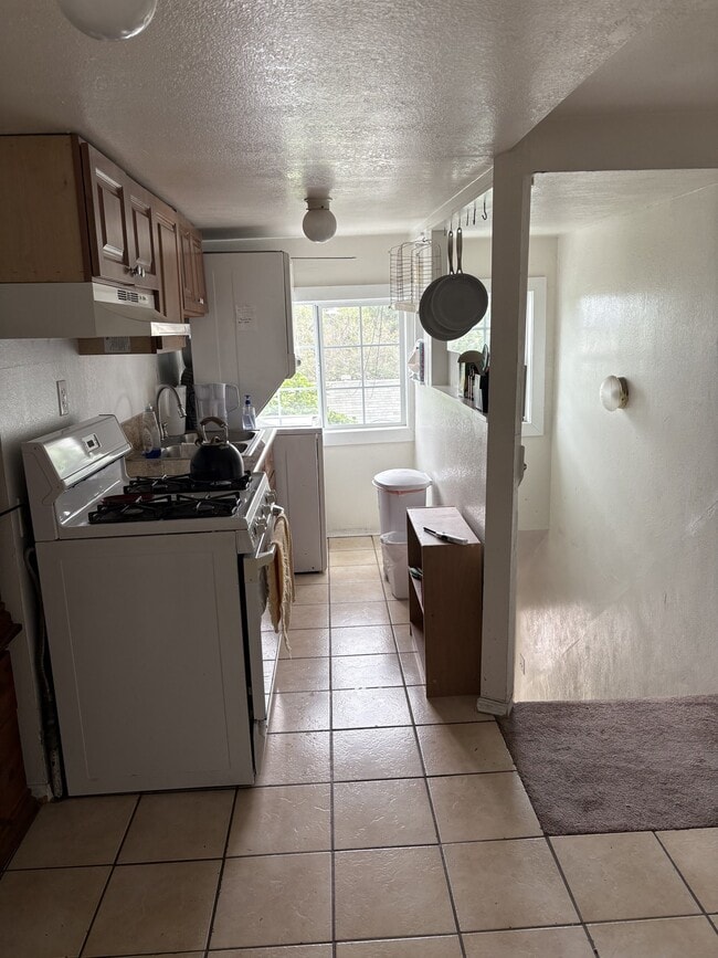 Photo - 144 E 60th St Unidad 142 1.2