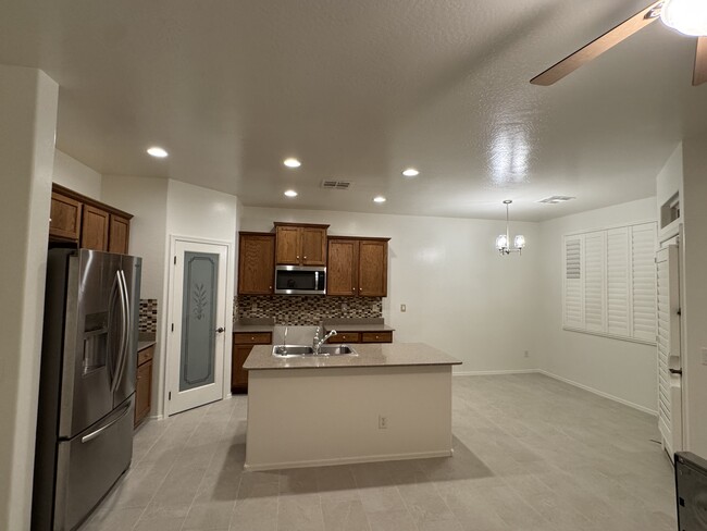 kitchen - new microwave and dishwasher - 3339 E Comstock Dr House