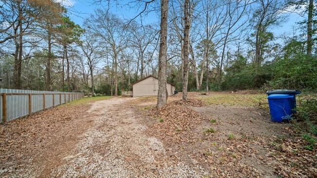 Photo - Rural, wooded living in this 4 bedroom, 2 full bath home on just under a quarter of an acre. NEW ...