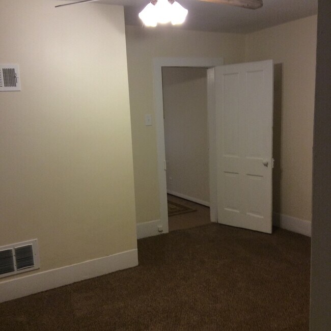 From Bedroom into Living Room - 418 S Commercial St