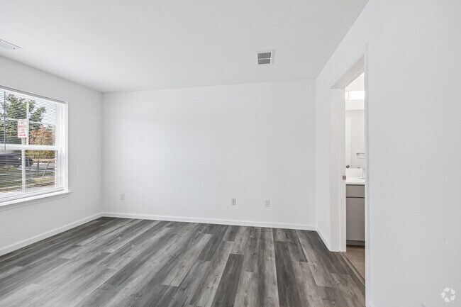 3BR, 2BA - 1,243SF - Primary Bedroom