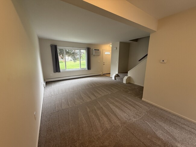 Bright and spacious living area. Brand new carpet in every room. - 1133 Tienken Ct