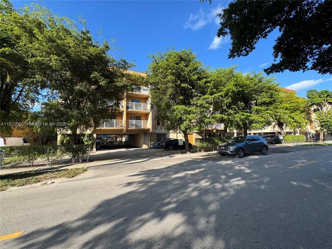 Building Photo - 1085 W 68th St Unit 307