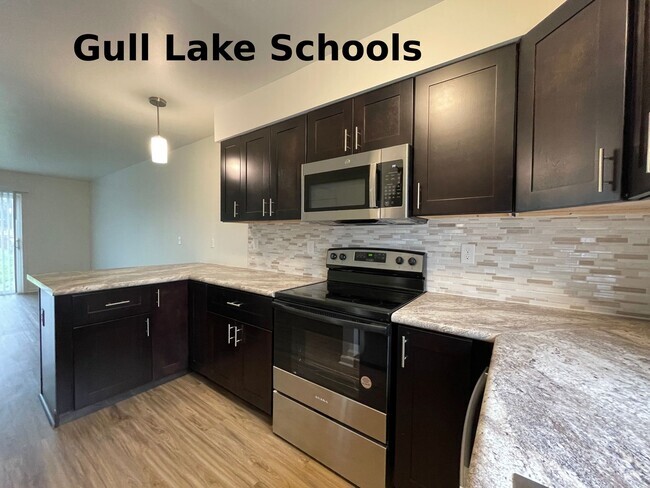 Building Photo - Charming Townhome with Patio in Quiet Comm... Unit 5711 East G Ave. 1