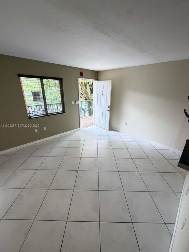 Building Photo - 12625 SW 91st St Unit 209