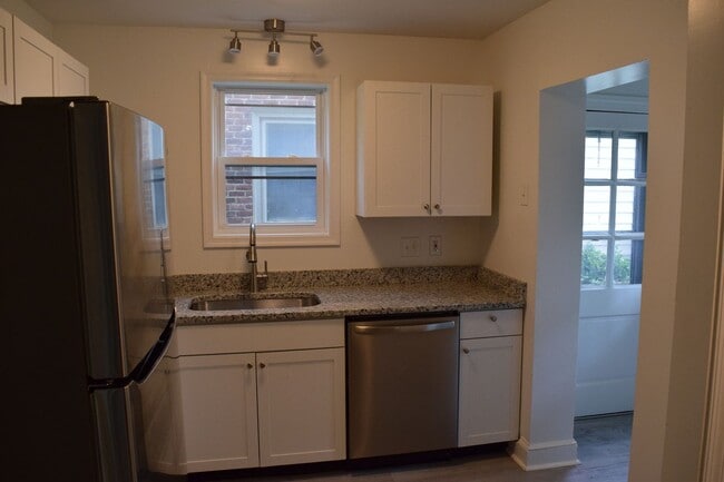 Photo - Charming Northside Two-Story Brick Home With 2 car garage and basement