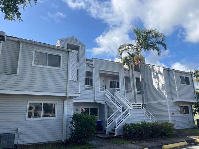 Building Photo - 3445 NW 44th St Unit 206