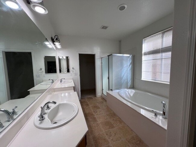 Photo - Spacious home featuring nearly 3,100 square feet of living space. Close to schools, parks and sho...