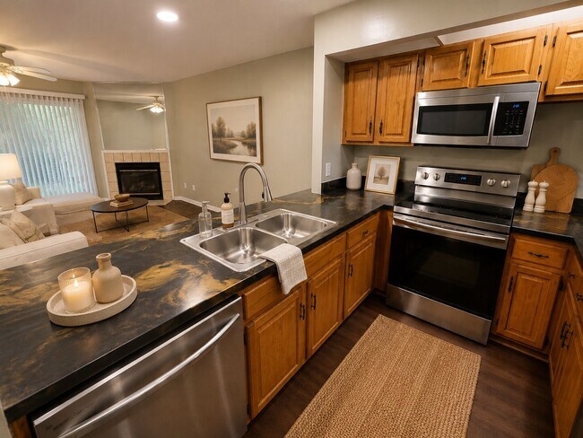 2BR/2.5BA Townhome with In-Unit Laundry, Fenced Backyard, Garage, & Fireplace! Move-In Ready! Pri...