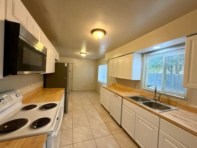 Photo - 3 BED 2 BATH HOUSE WITH NEW LUXURY VINYL PLANK FLOORING
