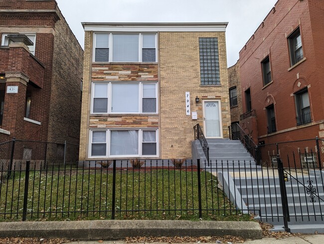 Building Photo - 7946 S Peoria St Unit 1