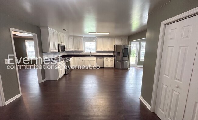 Photo - Spacious 5 Bed/3 Bath Home with Garage / Available Soon!
