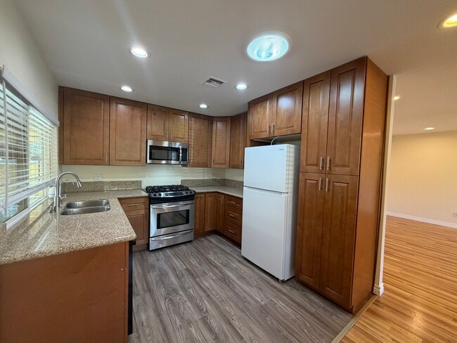 Remodeled Kitchen - New Floors. Stainless Steel Stove & Microwave - 1914 Altamont Ct