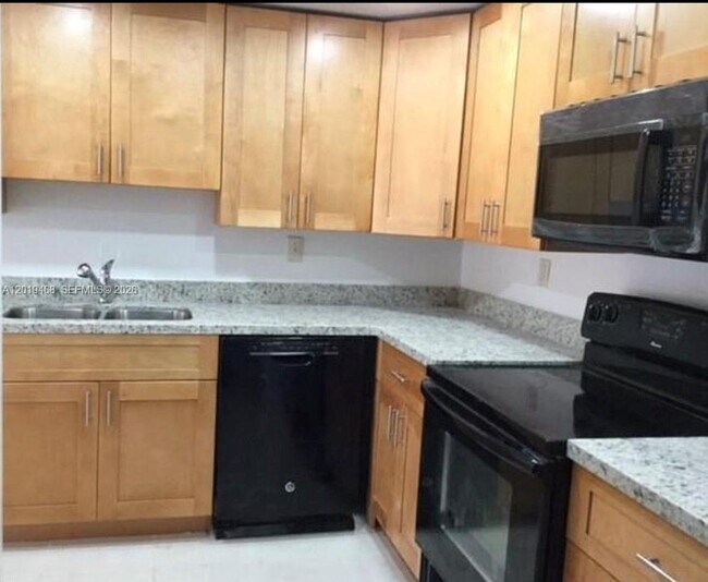 Photo - 6950 Miami Gardens Dr Unit 2-211
