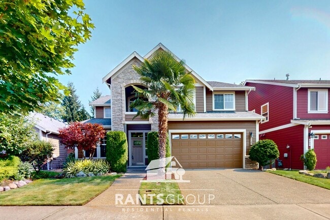 Building Photo - Spacious 5-Bedroom Home with Den & Bonus R...