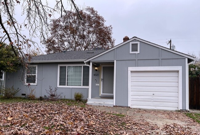 Building Photo - Bright, Updated Home with Garage, Laundry, and Private Yard