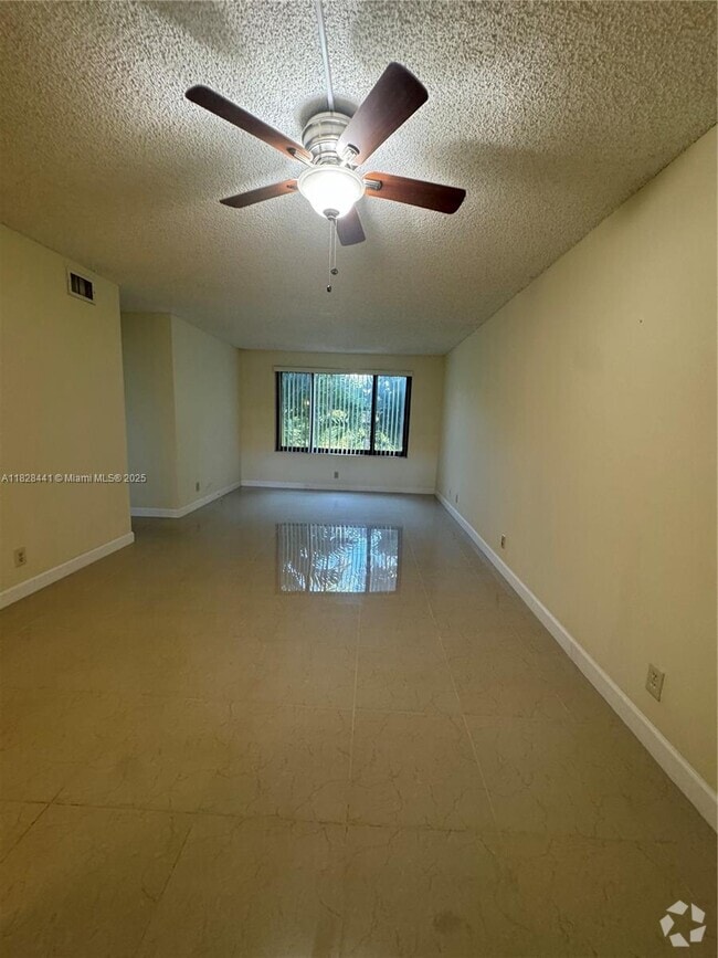 Building Photo - 11441 NW 39th Ct Unit 219-3 Rental