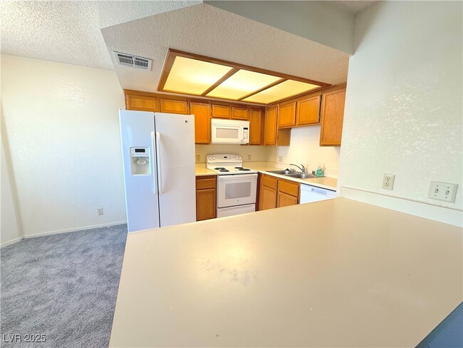 Building Photo - 7961 Lions Rock Way Unit 201 Rental