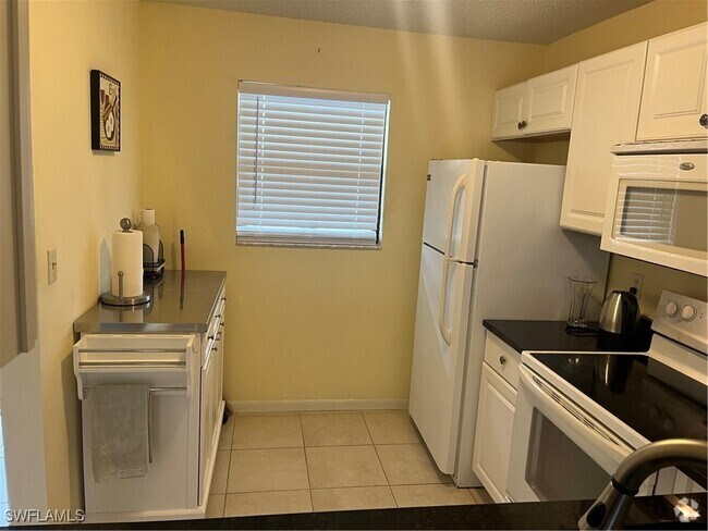 Building Photo - 9261 Central Park Dr Unit 206 Rental