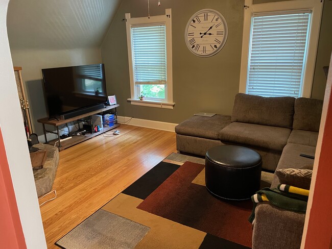 Living Room - 3285 S Delaware Ave Apartments Unit Upper