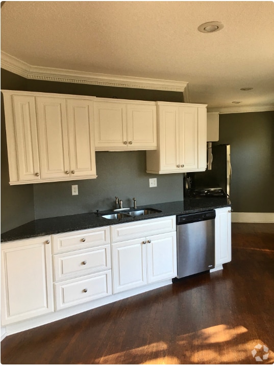 Updated kitchen with granite countertops and stainless steel appliances - 1233 46th St Rental