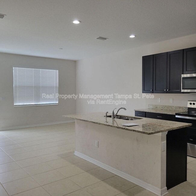 Photo - 6409 Tillandsia Pl