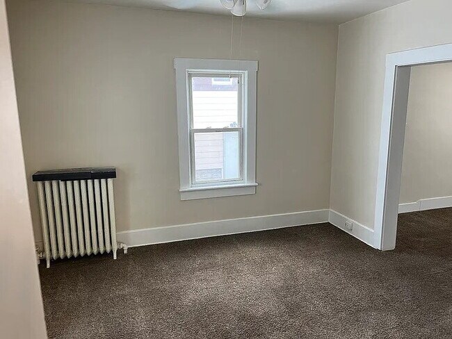 Photo - Freshly painted 3/1 in Kenmore...with a detached garage.