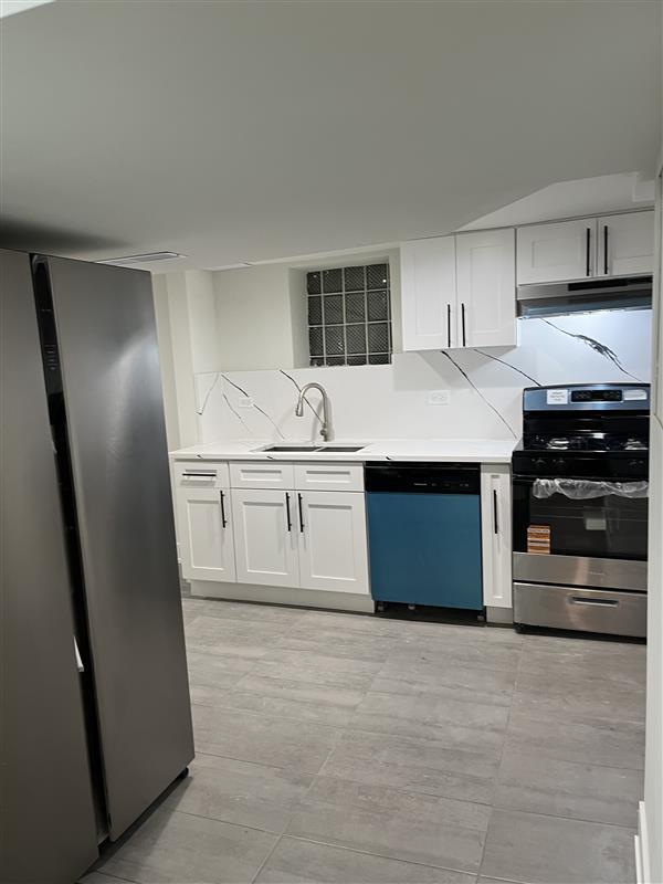 Building Photo - 5624 N Marmora Ave Unit 1a