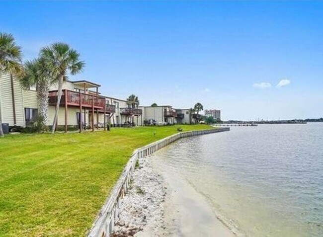 Photo - Expansive waterfront covered patio off this fully renovated Fort Walton Condo!
