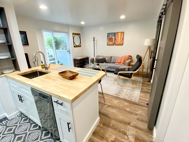 Building Photo - 4045 54th Ave SW Unit 1 Genesee Gem