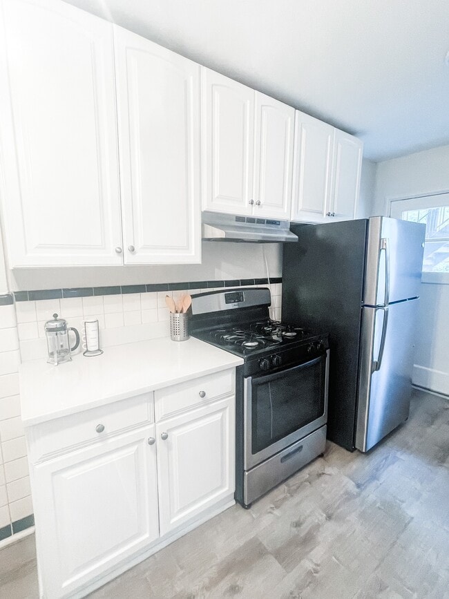 Updated kitchen - 8150 Whitburn Dr Apartments Unit 2W
