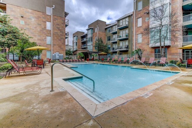 Refreshing Pool with water feature - HemisView Village Apartments