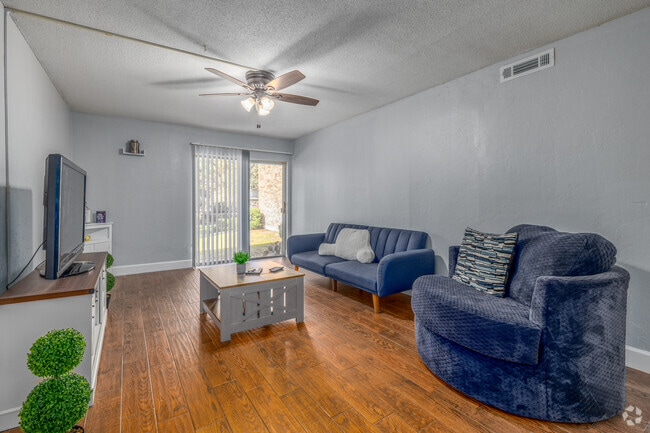 1BR, 1BA - 745SF Living Room - Country Village Apartments