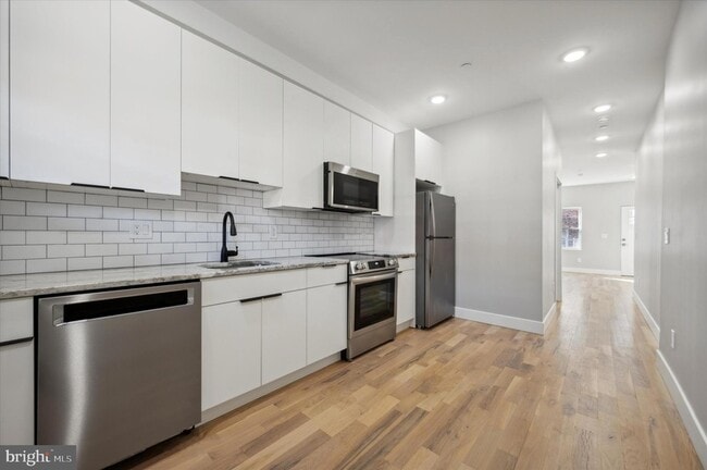 Building Photo - 5412 Delancey St Unit A