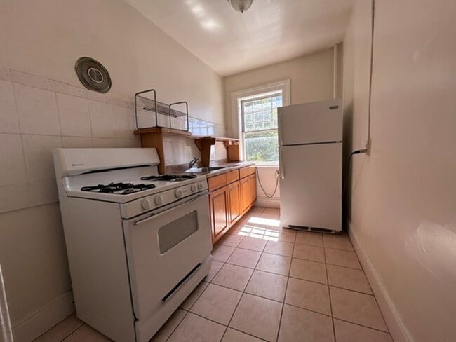 Photo - Spacious, Studio, One Bath Unit, with upgraded floors, above commercial shops Unit 4