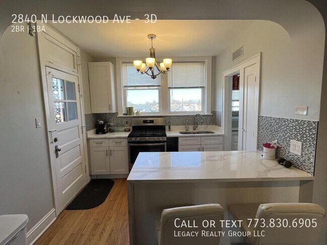 Building Photo - 2840 N Lockwood Ave Unit 3D