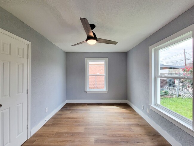 Photo - This beautifully updated 4-bedroom home is just under two miles from Highway 288 and Loop 610, ma...