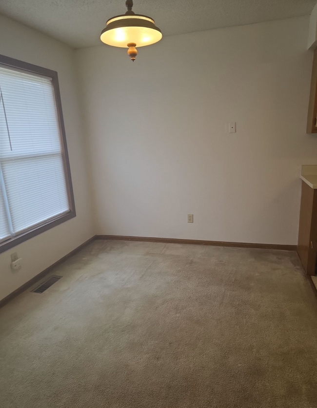 Photo - 3 Bed 2.5 Bath 2 Car Garage Split Duplex- Pets ok!