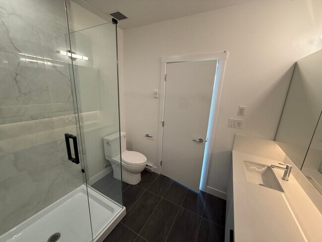 Beautiful Top Floor Corner Condo