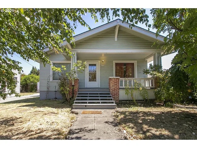 Building Photo - 6342 N Greeley Ave Unit A