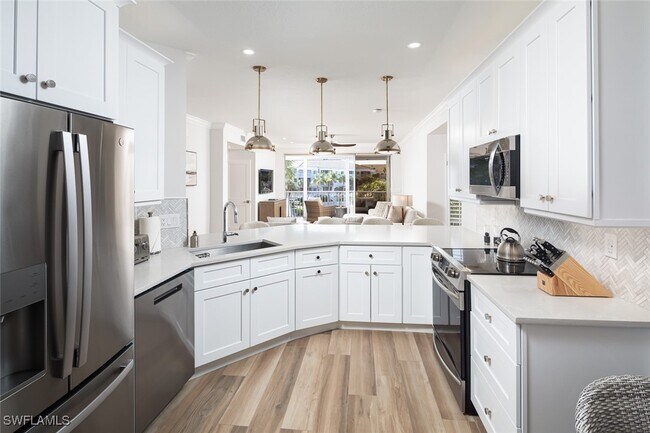 Building Photo - 7638 Pebble Creek Cir Unit 204