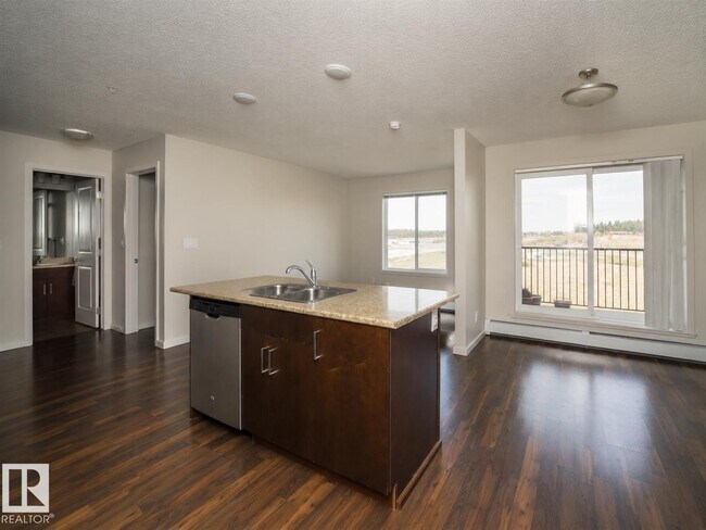Photo - #325 5515 7 AV SW