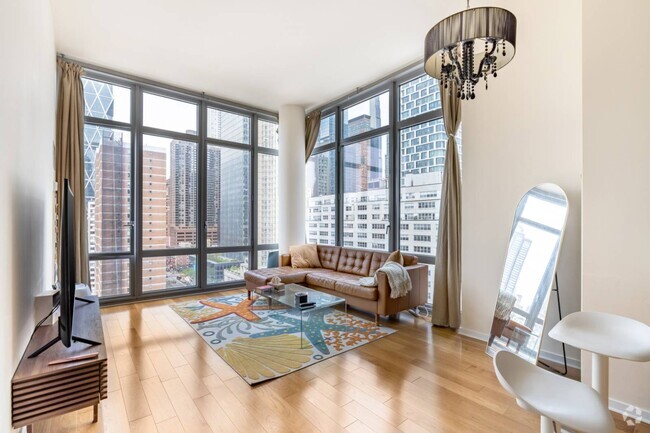 Building Photo - 310 W 52nd St Unit 16J Rental