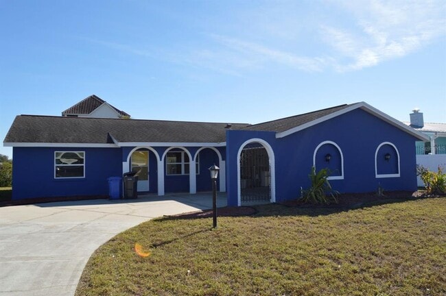 Building Photo - 6525 Manila Palm Way