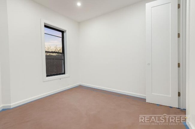 Photo - Stylish 1-Bedroom Apartment with Modern Amenities in Bed-Stuy