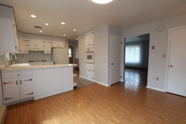 Photo - Charming 2-Bedroom Home with Spacious Yard & Sunroom – $1,600/Month